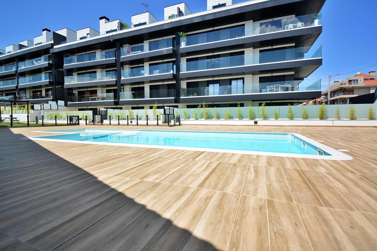 Impresionante apartamento con piscina en Sanxenxo Esterno foto
